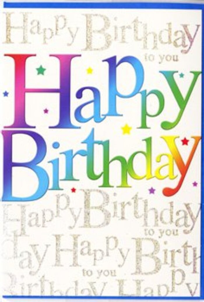 This birthday card design feels like a compact celebration, the visual equivalent of walking into a surprise party in Bounds Green with music playing and flowers on the table. At the centre, the large words Happy Birthday curve gently across the card in broad, rounded letters, each character filled with a silky gradient of colour. From one side to the other, tones shift from strong crimson and raspberry into bright fuchsia, then slide through sapphire blue, teal, and fresh green before brightening to buttery yellow and soft orange at the opposite edge. The smooth blending between hues gives the letters a painterly richness, as if they were carefully shaded by hand. A delicate shadow effect nestles beneath the lettering, adding depth and making the phrase stand out crisply against its background. Surrounding the main words, small bursts of star shapes and confetti-like specks in complementary colours are dotted across the surface, lending a feeling of movement, like a handful of coloured paper tossed into the air at the moment of a birthday toast. The background itself is filled with repeating cursive writing in metallic gold, the phrase Happy Birthday to you looping gracefully across the card in parallel lines. The script is slender and refined, and the gold ink reflects a soft shimmer when the card is tilted, reminiscent of golden light catching tree leaves around Bounds Green's quieter residential streets at dusk. This fine calligraphy forms a gentle, glittering backdrop that never overshadows the bold rainbow message, instead wrapping it in a sense of warmth and affection. The overall impression is of a quality birthday card with a smooth, slightly glossy surface, perfect for pairing with a cheerful floral arrangement for a loved one celebrating nearby.